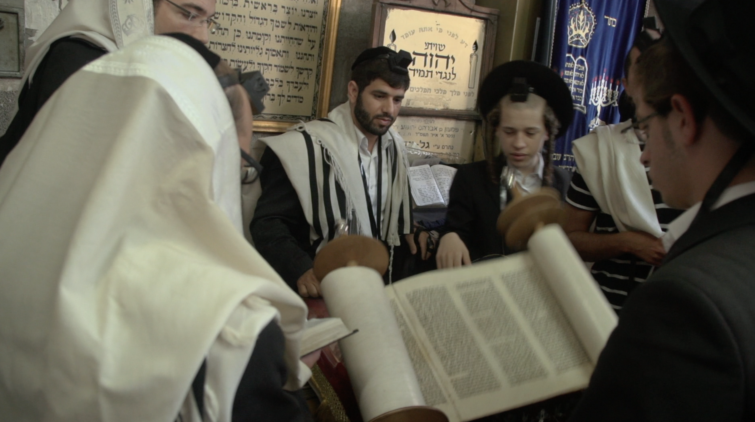 Orthodox Jews worshipping in a synagogue in  B'nei Brak